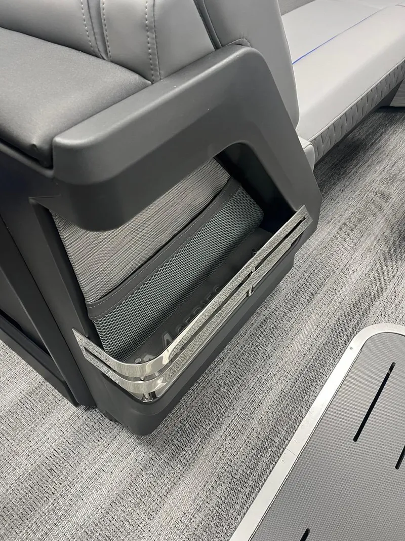 Slide: The Image of 2025 Bennington 24 MSB boat interior with sleek seating and modern design elements. - 12