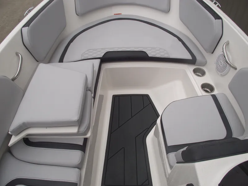 Slide: The Image of 2025 Bayliner Element M15 boat interior with gray seating and modern design. - 14