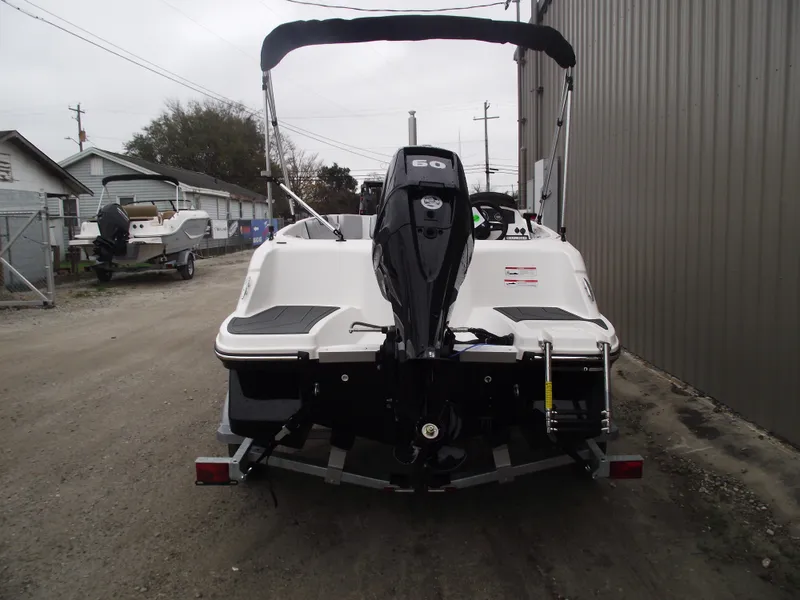 Slide: The Image of 2025 Bayliner Element M15 boat with outboard motor. - 3