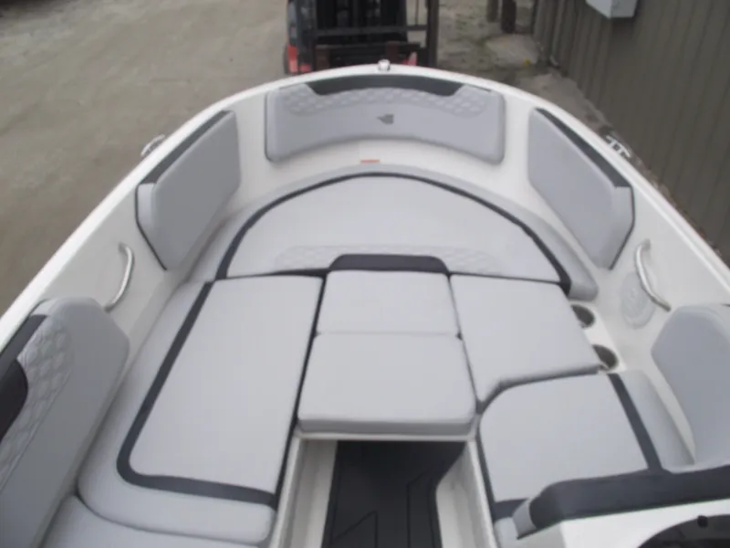 Slide: The Image of 2025 Bayliner Element M15 boat interior with cushioned seating and modern design. - 6