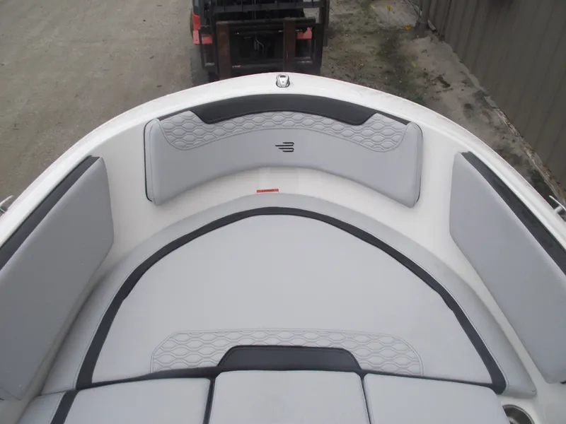 Slide: The Image of 2025 Bayliner Element M15 boat interior with cushioned seating. - 7