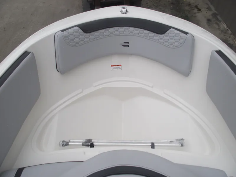 Slide: The Image of 2025 Bayliner Element M15 boat interior with gray seating and sleek design. - 8
