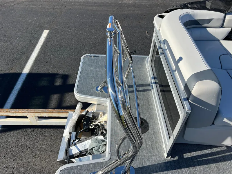 Slide: The Image of 2025 Godfrey Sweetwater 2286 C Special Edition boat with chrome railing and seating. - 15