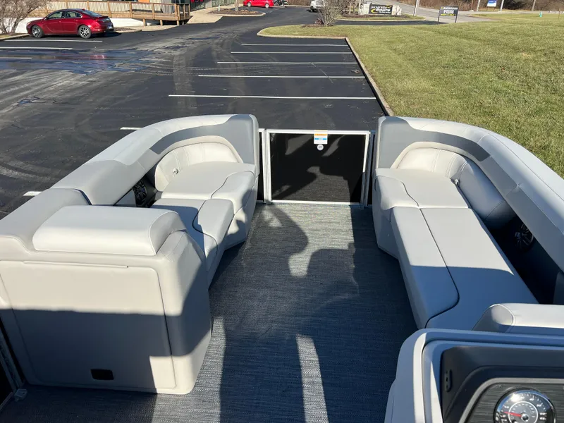 Slide: The Image of 2025 Godfrey Sweetwater 2286 C Special Edition pontoon boat interior with gray seating. - 22