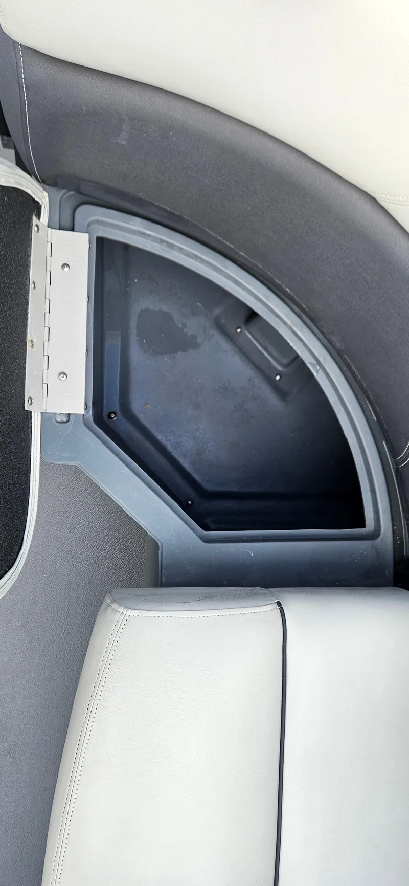 Slide: The Image of 2023 Sylvan Mirage X3 Tritoon storage compartment with sleek design and durable materials. - 13