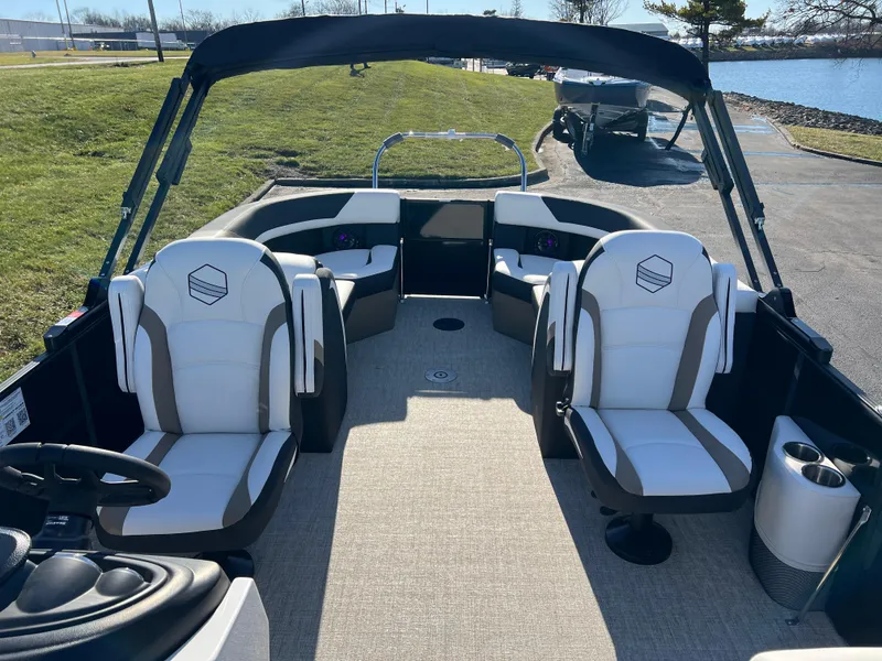 Slide: The Image of 2025 South Bay 222 RS pontoon boat interior with plush seating and modern design. - 12