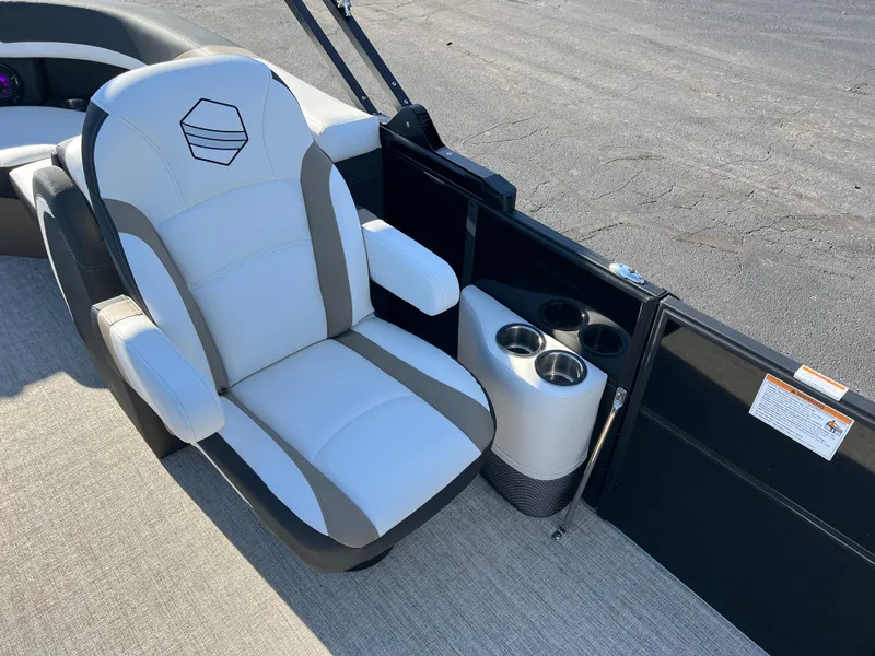 Slide: The Image of 2025 South Bay 222 RS boat seat with cup holders, featuring sleek design and comfort. - 13
