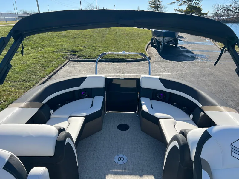 Slide: The Image of 2025 South Bay 222 RS pontoon boat interior with plush seating and modern design. - 14