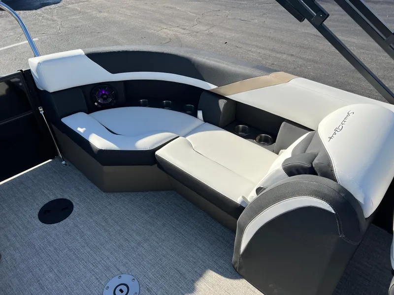 Slide: The Image of 2025 South Bay 222 RS boat interior with plush seating and modern design. - 15