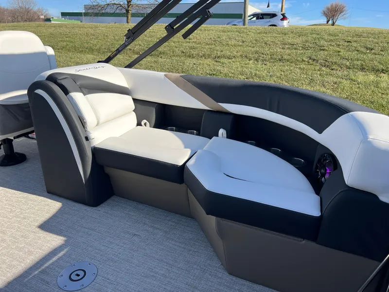Slide: The Image of 2025 South Bay 222 RS boat interior with plush seating and modern design. - 18