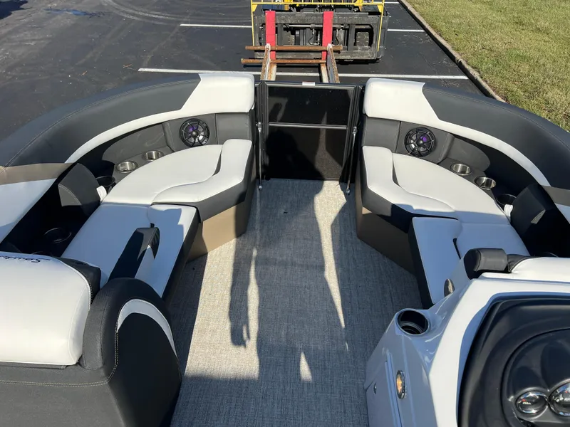 Slide: The Image of Interior of 2025 South Bay 222 RS pontoon boat with plush seating and modern design. - 25