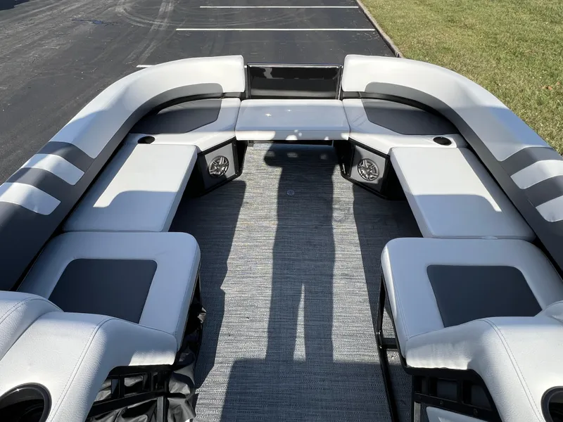 Slide: The Image of 2025 Godfrey Mighty G 1476 C boat interior with spacious seating and modern design. - 17