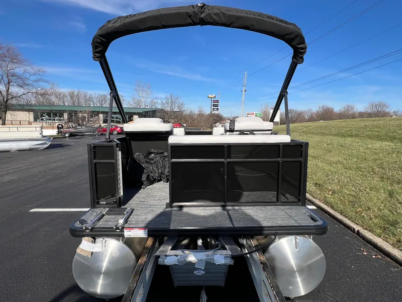 Slide: The Image of 2025 Godfrey Mighty G 1476 C pontoon boat, rear view in parking lot. - 6