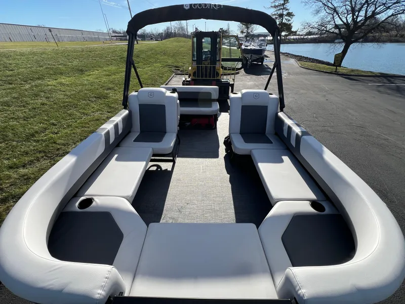 Slide: The Image of 2025 Godfrey Mighty G 1476 C pontoon boat with spacious seating and sleek design. - 7