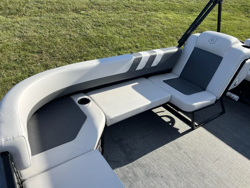 Slide: The Image of Luxurious seating on 2025 Godfrey Mighty G 1476 C boat, featuring sleek design and comfort. - 9