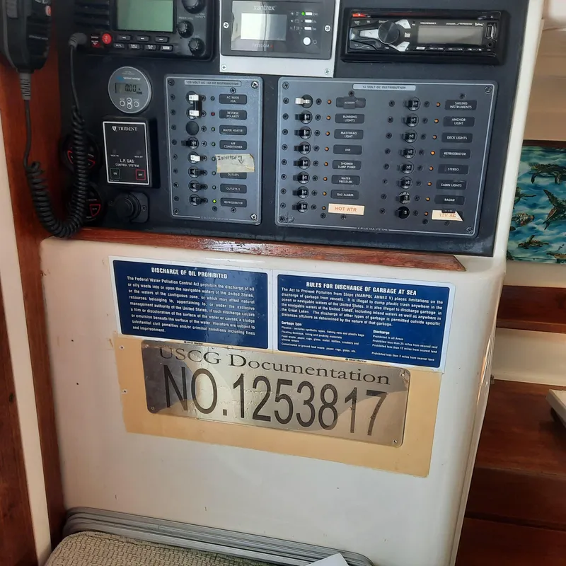 Slide: The Image of Control panel of a 2006 Gemini 105 MC boat with USCG documentation number. - 16