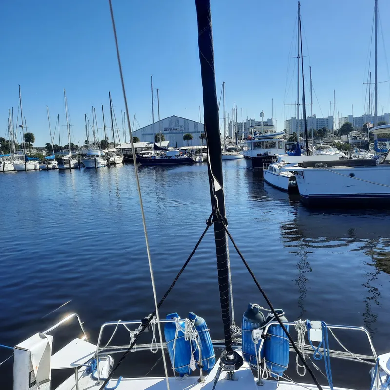 Slide: The Image of Gemini 105 MC 2006 catamaran docked in a marina with other boats. - 20