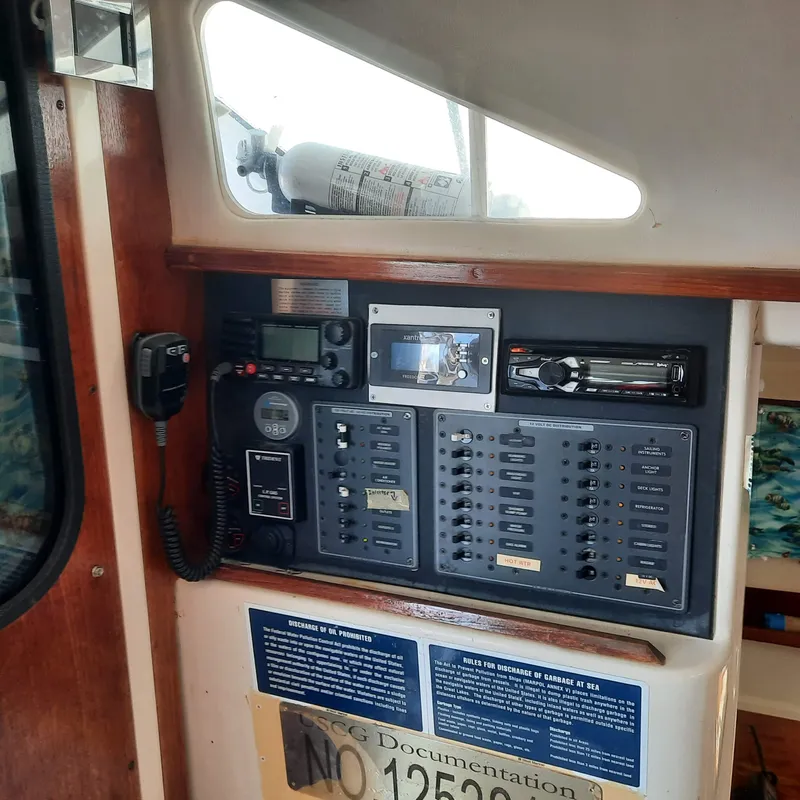 Slide: The Image of Control panel of a 2006 Gemini 105 MC boat with navigation equipment. - 9