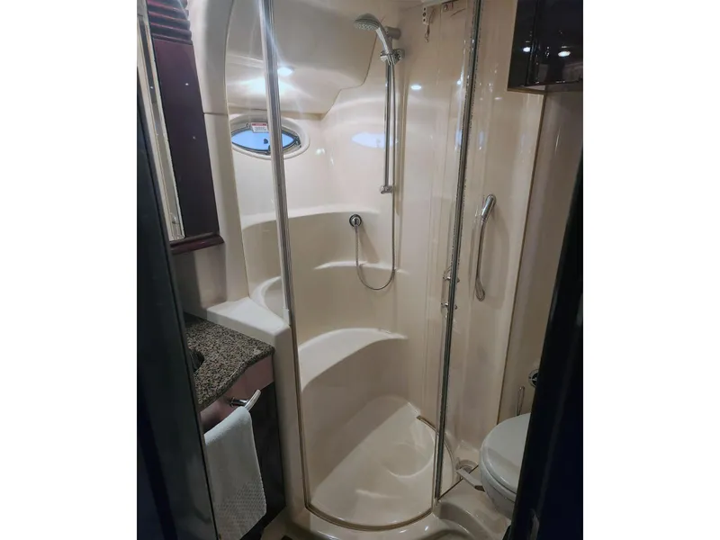 Slide: The Image of Luxurious bathroom in 2007 Sea Ray 52 Sedan Bridge yacht with modern shower and amenities. - 13