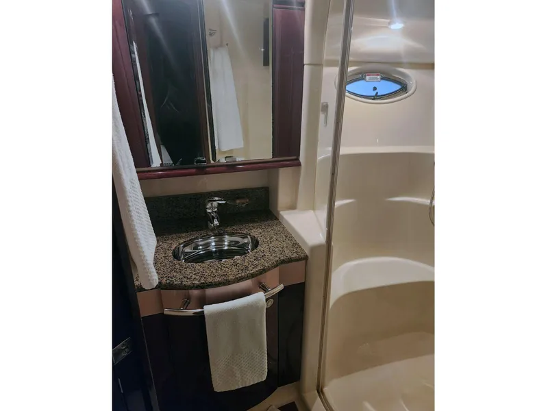 Slide: The Image of Luxurious bathroom in 2007 Sea Ray 52 Sedan Bridge yacht with modern fixtures. - 15
