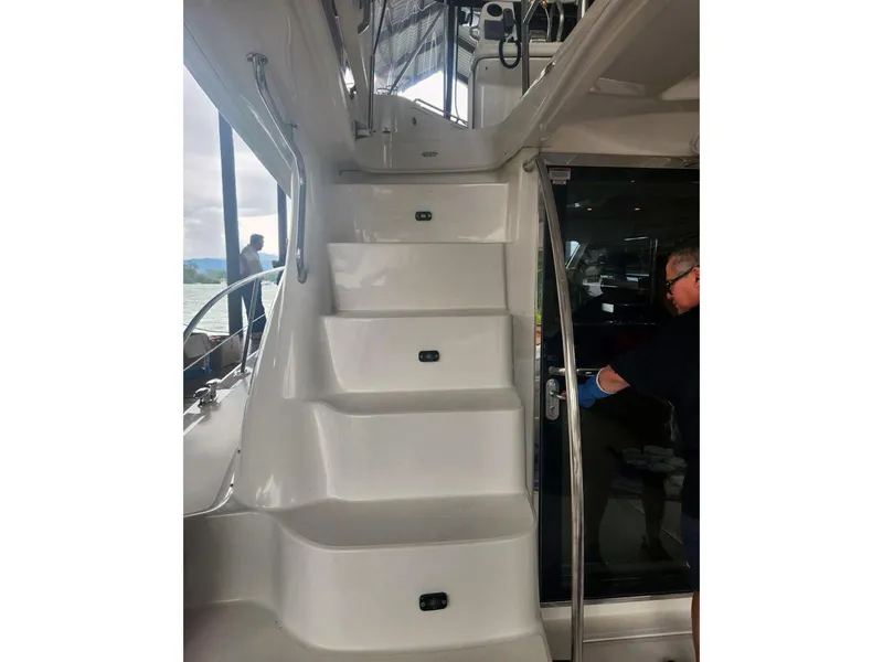 Slide: The Image of 2007 Sea Ray 52 Sedan Bridge interior stairs and doorway. - 7