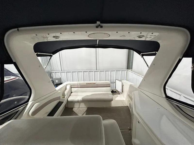 Slide: The Image of Interior view of 2002 Fountain 38 Express Cruiser, featuring spacious seating and sleek design. - 23