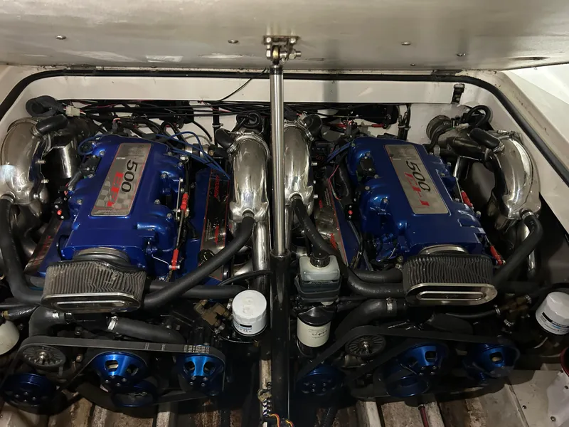 Slide: The Image of Twin engines of a 2002 Fountain 38 Express Cruiser, showcasing powerful performance. - 34