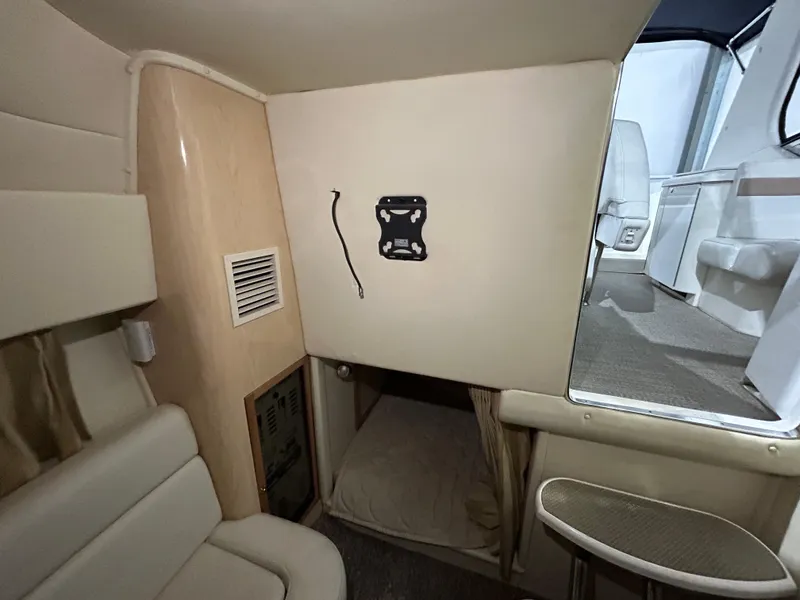 Slide: The Image of Interior of 2002 Fountain 38 Express Cruiser with seating and small sleeping area. - 47