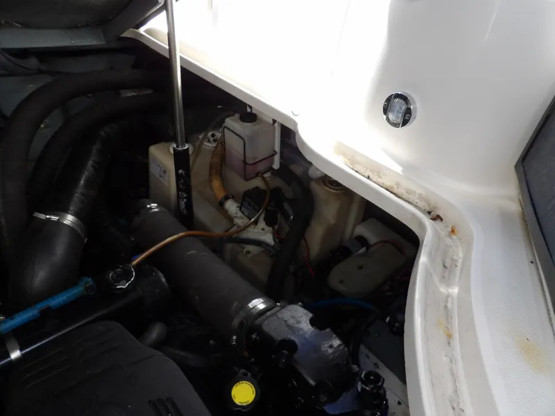 Slide: The Image of Engine compartment of 2004 Sea Ray 320 Sundancer boat. - 31