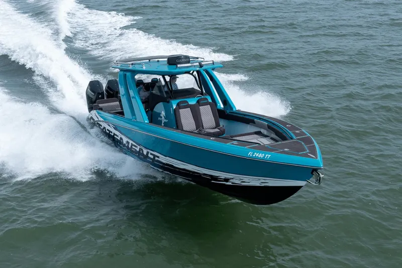 Slide: The Image of 2024 Statement 38 Open boat cruising on water, showcasing sleek design and powerful performance. - 14