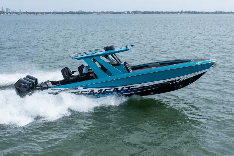Slide: The Image of 2024 Statement 38 Open boat cruising on water, showcasing sleek design and powerful engines. - 16