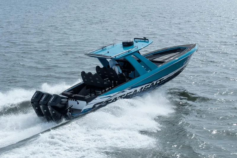 Slide: The Image of 2024 Statement 38 Open boat cruising on water with powerful engines. - 17