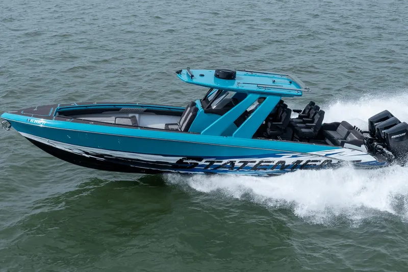 Slide: The Image of 2024 Statement 38 Open boat cruising on water, showcasing sleek design and powerful engines. - 19