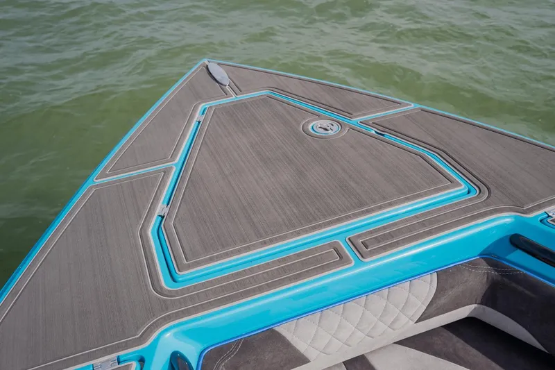 Slide: The Image of 2024 Statement 38 Open boat deck with sleek design and vibrant blue accents. - 35