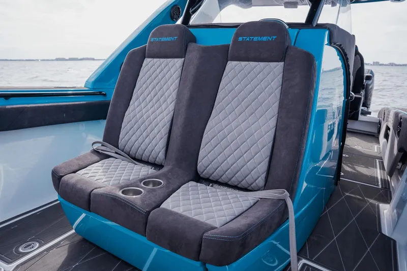 Slide: The Image of 2024 Statement 38 Open boat seats with quilted design and cup holders. - 36