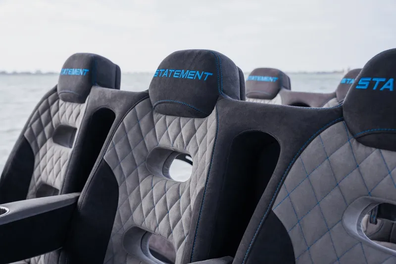 Slide: The Image of Luxurious seating on 2024 Statement 38 Open boat with quilted design and blue accents. - 38