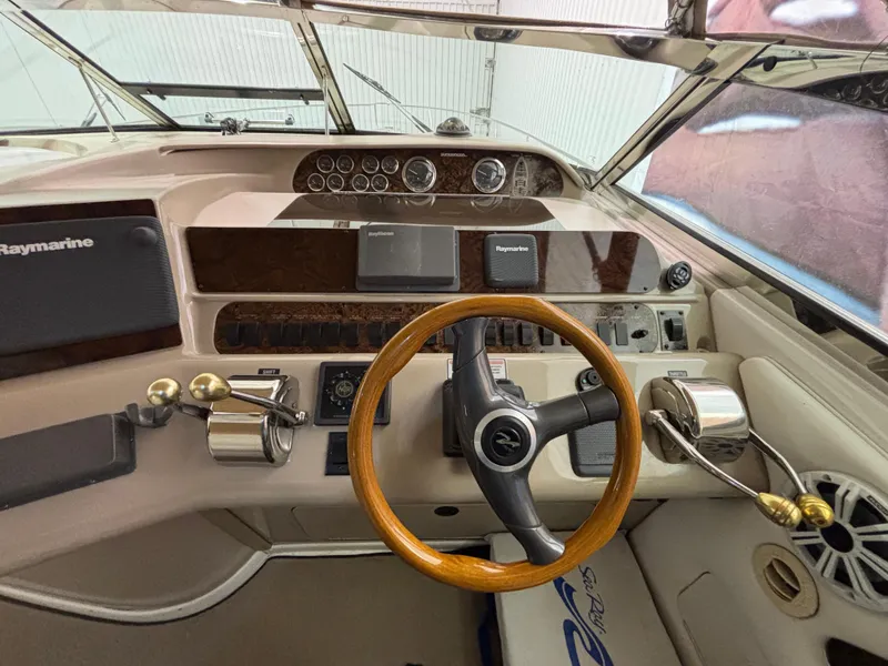 Slide: The Image of 1999 Sea Ray Sundancer 450 yacht interior with sleek design and modern amenities. - 15