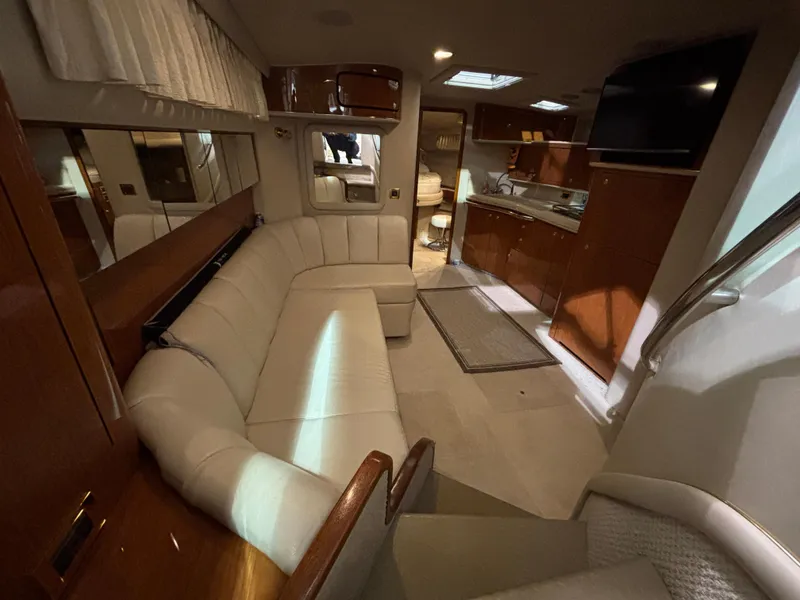 Slide: The Image of Control panel of a 1999 Sea Ray Sundancer 450 boat with labeled switches. - 21