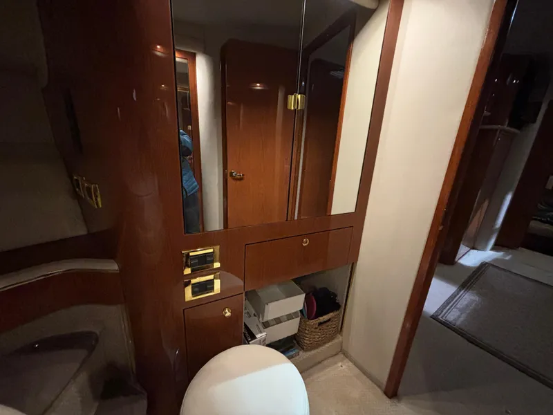 Slide: The Image of Washing machine inside a 1999 Sea Ray Sundancer 450 yacht cabinet. - 30