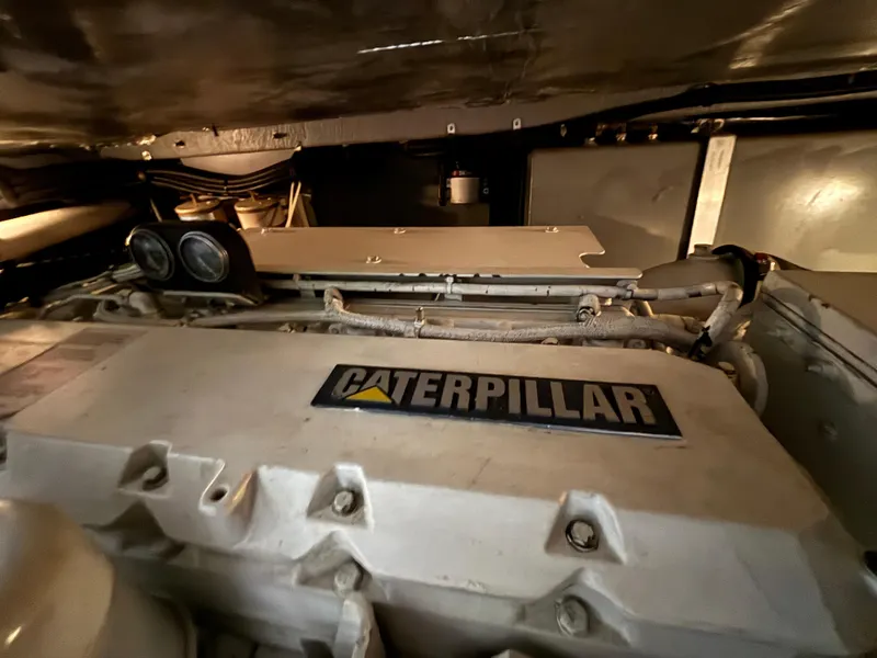 Slide: The Image of 1999 Sea Ray 450 Sundancer yacht in storage with protective cover. - 7