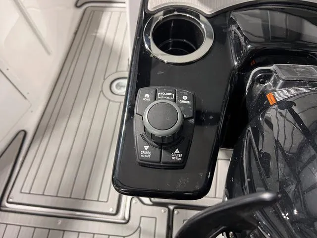 Slide: The Image of Control panel of 2025 Yamaha Boats 222SD with cruise and volume settings. - 18