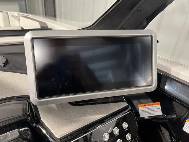 Slide: The Image of Dashboard display of 2025 Yamaha Boats 222SD, featuring a sleek touchscreen interface. - 19