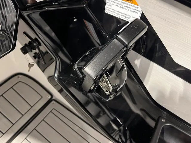 Slide: The Image of Close-up of 2025 Yamaha Boats 222SD control panel and key. - 20