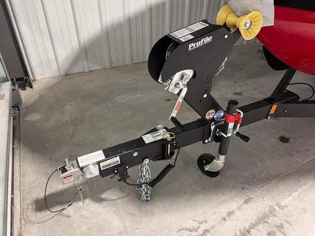 Slide: The Image of Trailer hitch of 2025 Yamaha Boats 222SD in a garage setting. - 3