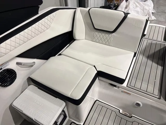 Slide: The Image of Luxurious seating on 2025 Yamaha Boats 222SD, featuring elegant white upholstery and modern design. - 9