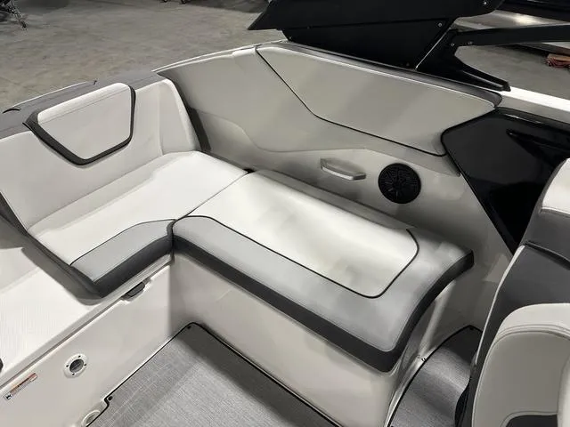 Slide: The Image of 2025 Yamaha AR250 boat interior with sleek seating and modern design. - 11