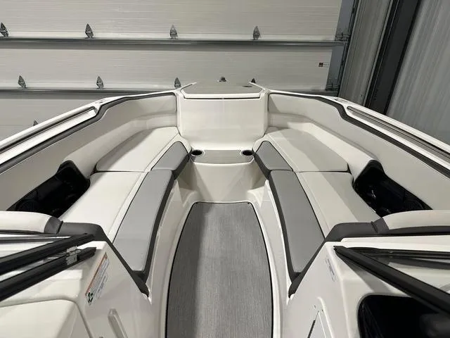 Slide: The Image of 2025 Yamaha AR250 boat interior with sleek seating and modern design. - 22