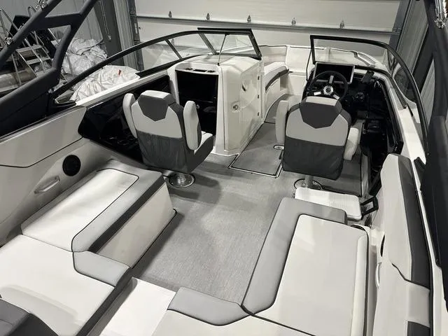Slide: The Image of 2025 Yamaha AR250 boat interior with modern seating and sleek design. - 8