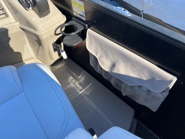 Slide: The Image of Interior of 2012 Premier Solaris 250 RF boat with seating and storage. - 19