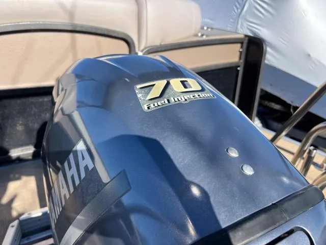 Slide: The Image of Yamaha 70 fuel injection engine on 2012 Premier Solaris 250 RF boat. - 30